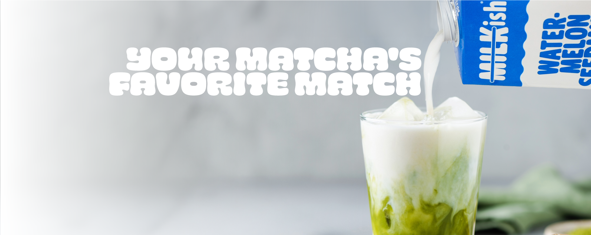 MILKish being poured into a matcha glass with 'Your Matcha's Favorite Match' text and a brand logo.