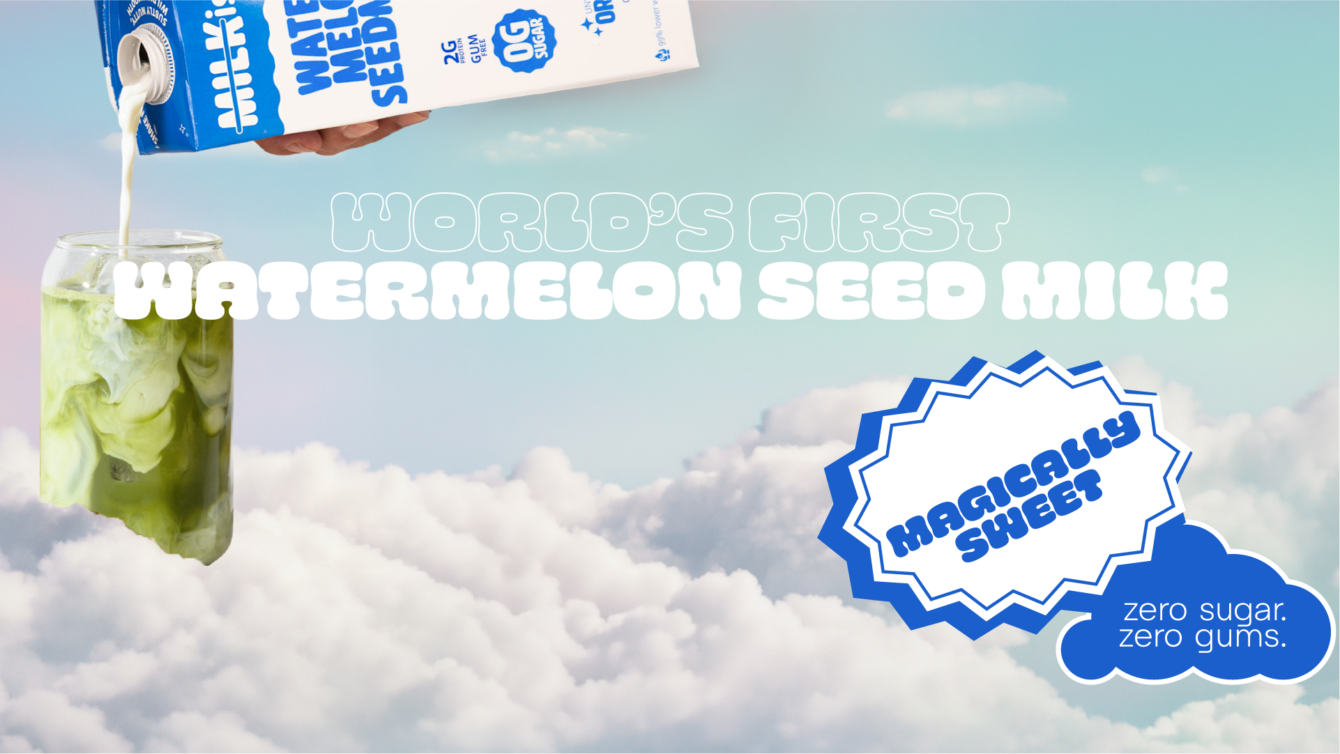 Mason jar with a watermelon seed milk matcha against a sky background, labeled 'World's First Watermelon Seed Milk' and 'Magically Sweet, zero sugar, zero gums'.